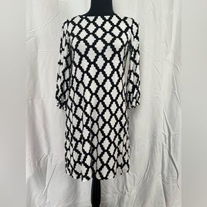 Great grab and go dress! Style with cute sandals or tennies for easy comfort!